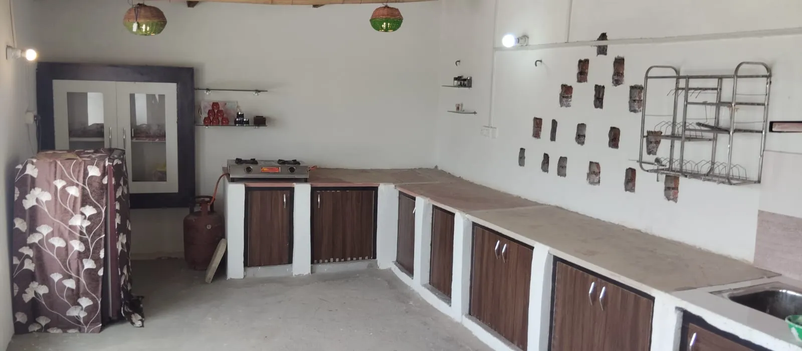 The kitchen where Dinesh and his family prepare meals for guests.